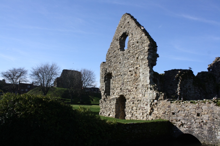 Norman House ruins from across the Mill Stream, with the Great Tower in the distance.